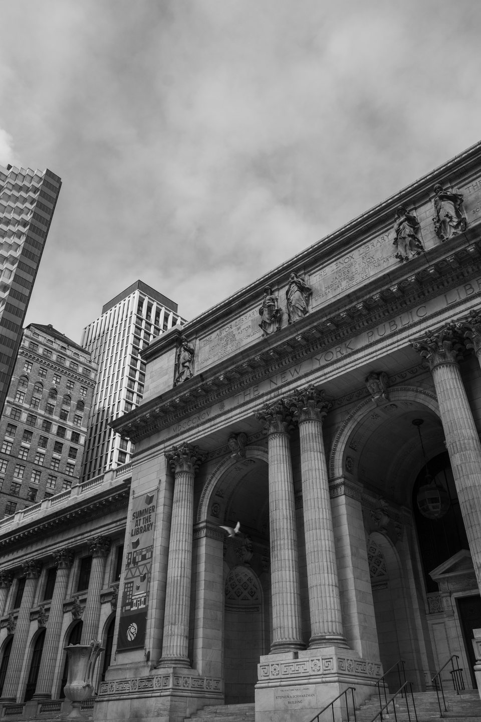 A neoclassical facade and columns seen from below